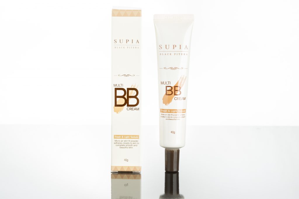 Image of this image showcases a supia black pitera multi bb cream, featuring both the product's tube and its packaging box. the bb cream promises a fresh and light texture, designed to adhere closely to the skin for a smooth, flawless complexion. ideal for