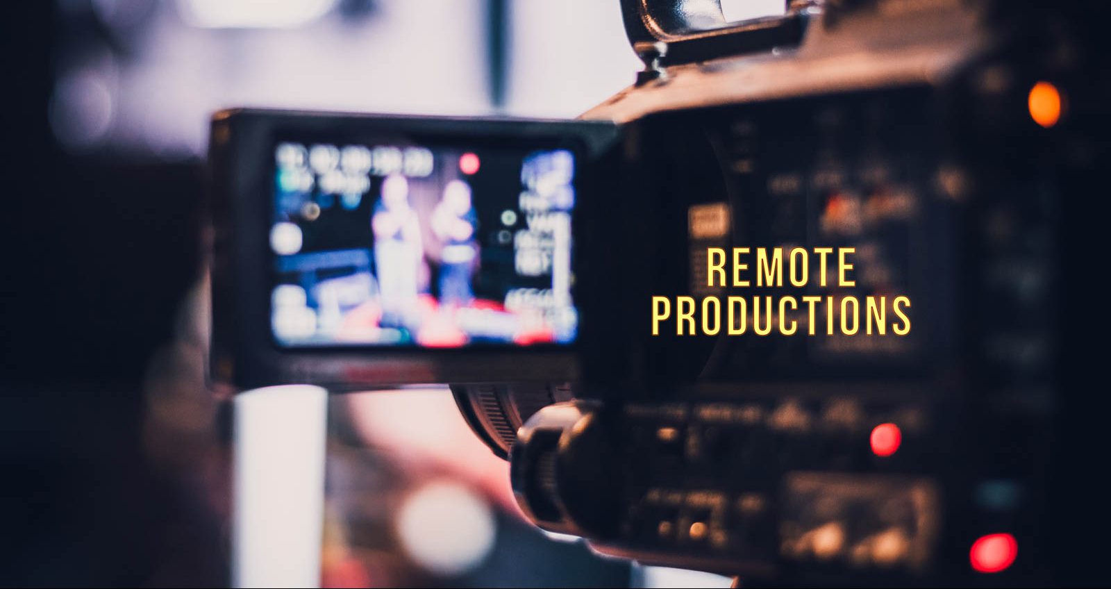 Image of the image features a professional video camera capturing a blurred scene, emphasizing "remote productions." this close-up highlights the focus on digital broadcasting and video production for remote events, illustrating the dynamic nature of modern media and technology solutions.