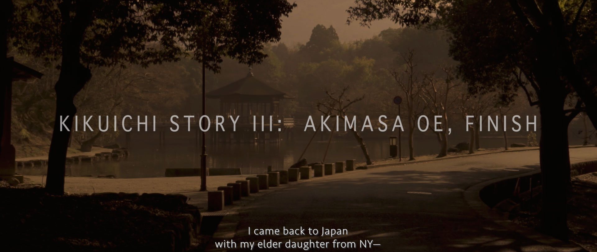 Image of the image captures a serene, tree-lined path beside a peaceful lake in japan, featuring a traditional gazebo amidst morning mist. atmospheric and tranquil, it highlights natural beauty. text overlays reveal "kikuichi story iii: akimasa oe, finish